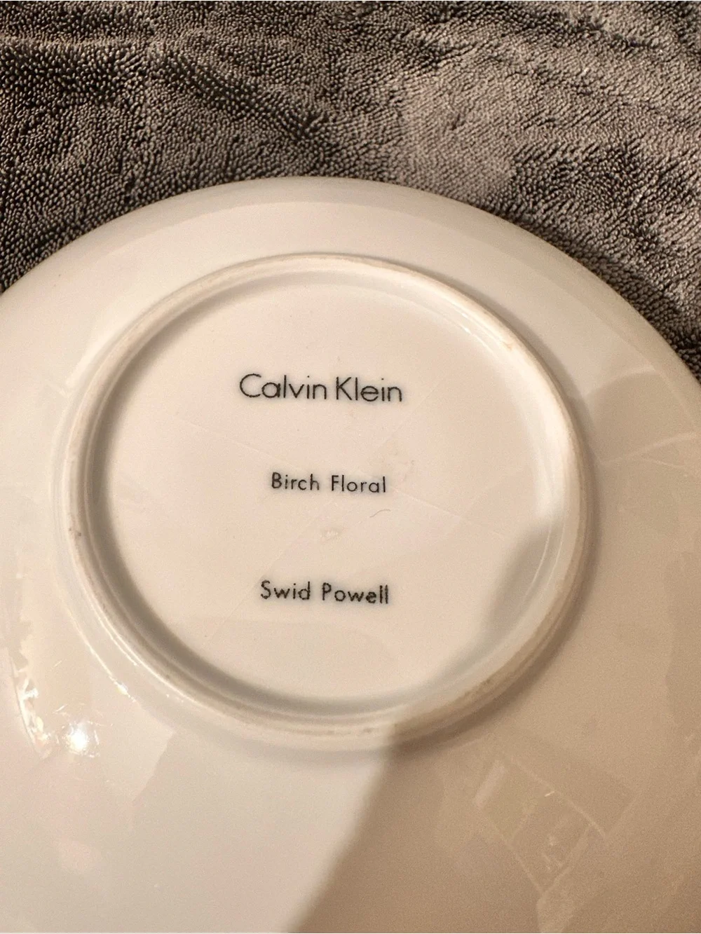 White Porcelain Dinner Plate with Blue Floral Accent